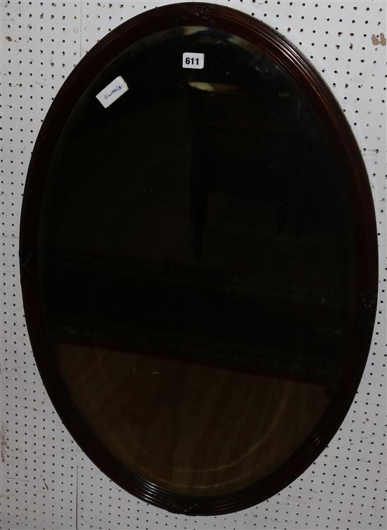 Oval bevelled wall mirror